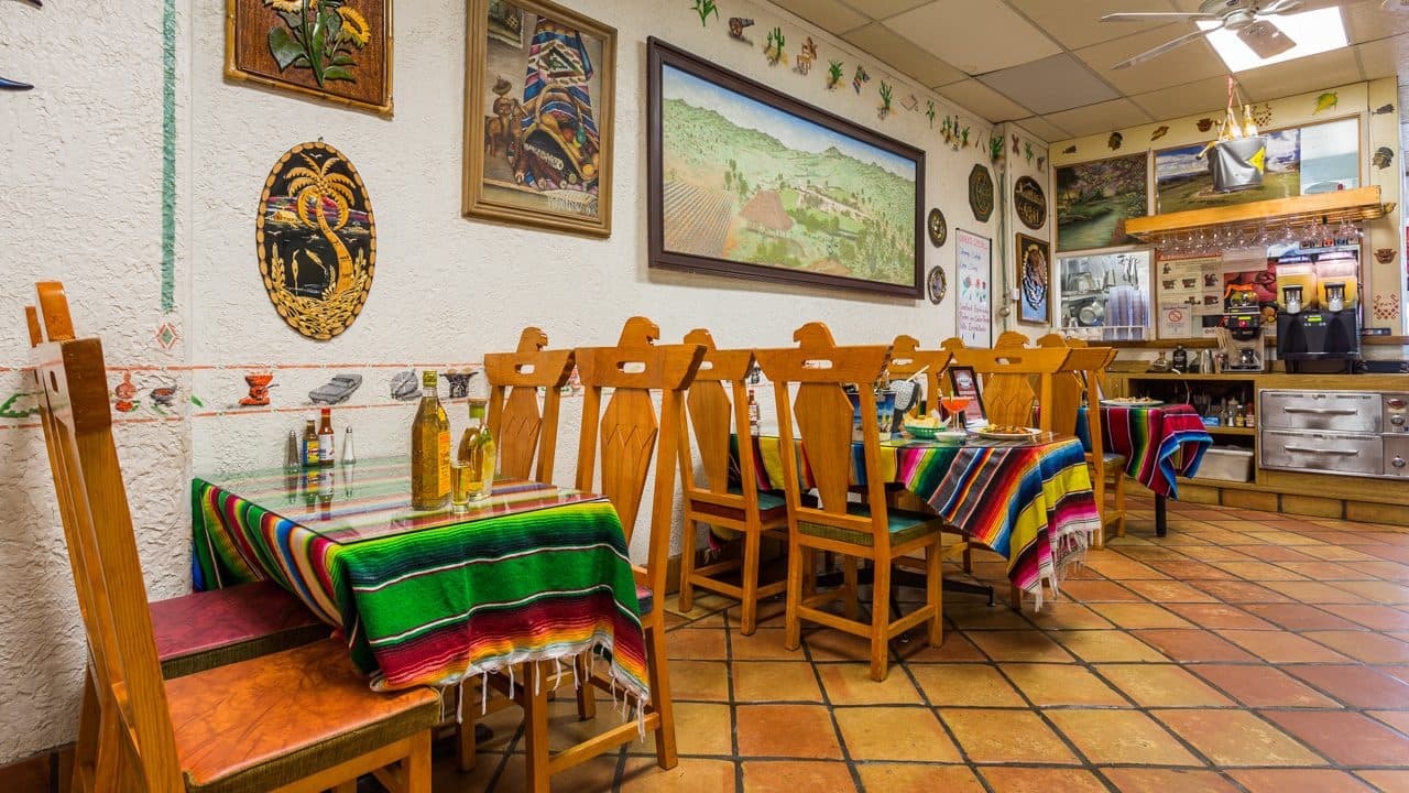 Dining room with hand-woven serape chair covers