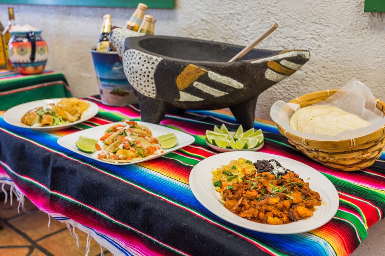Tacos served with a stone molcajete