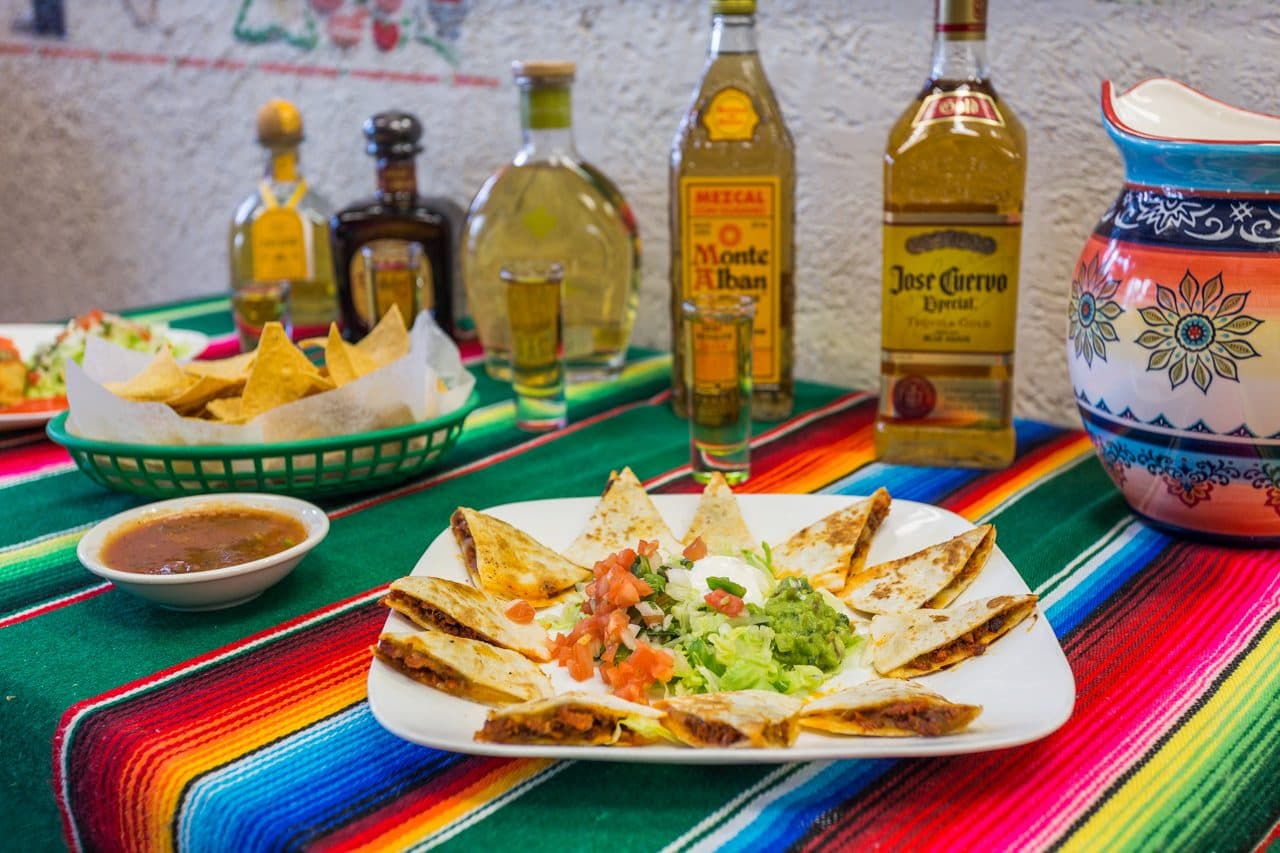 Nachos deluxe on a bright serape table runner